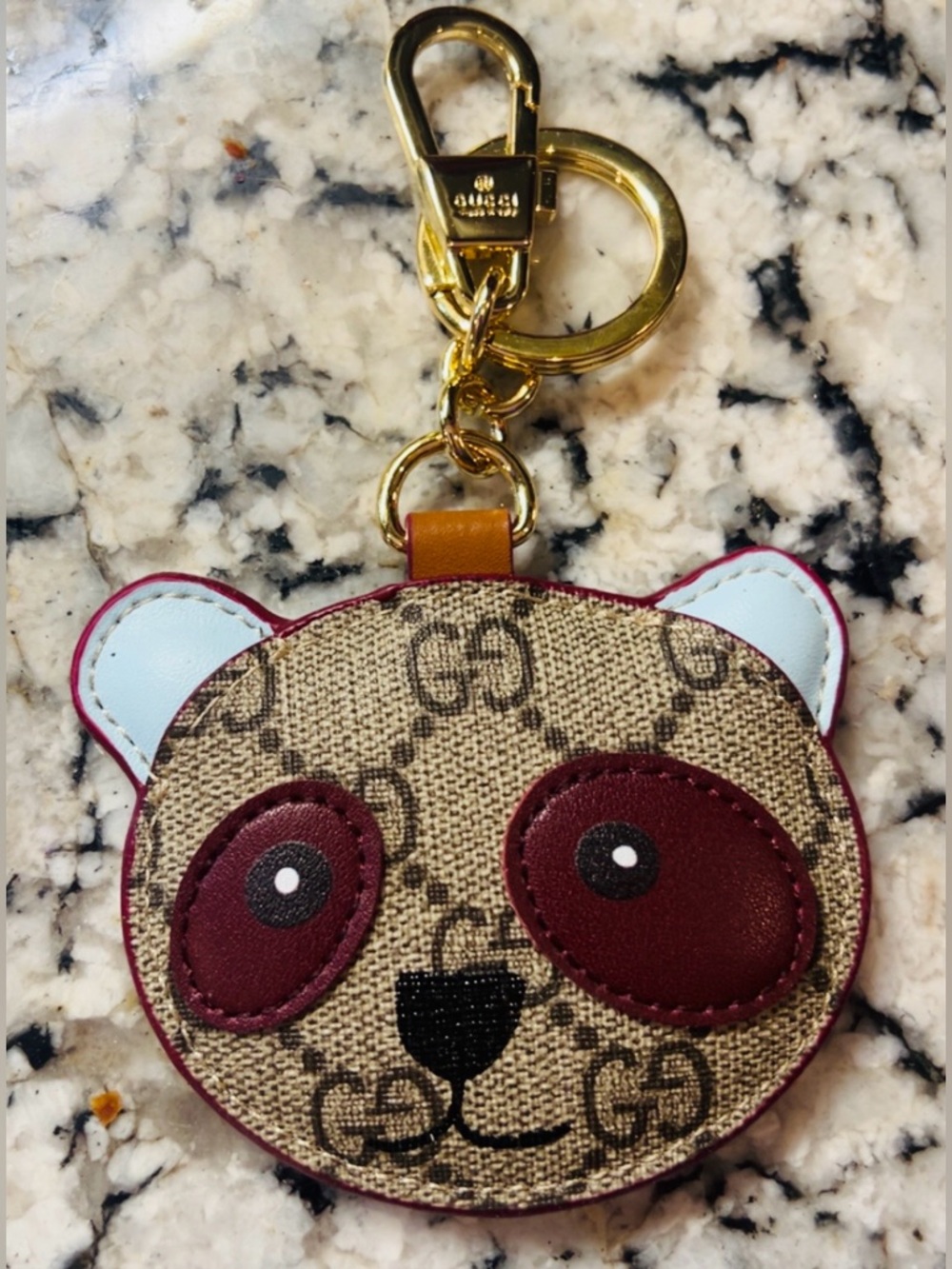 Adorable Gucci Monogram GG Panda Shaped Keychain with Gold Accents